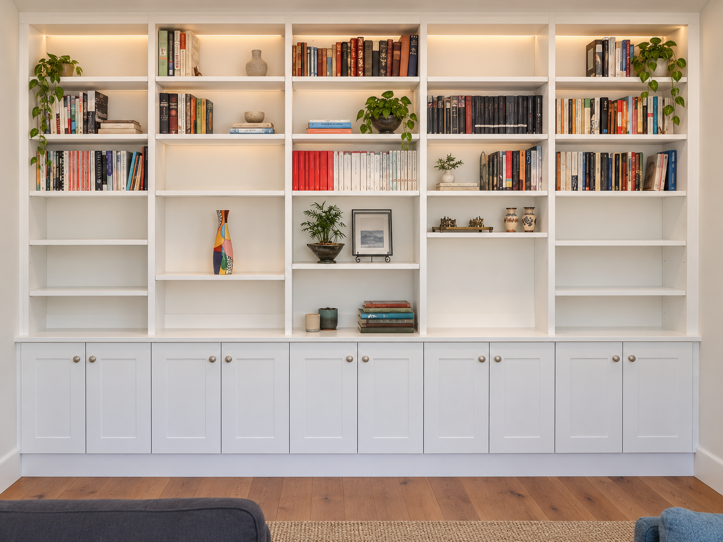 Bookcase with cupboards and fitted cabinetry