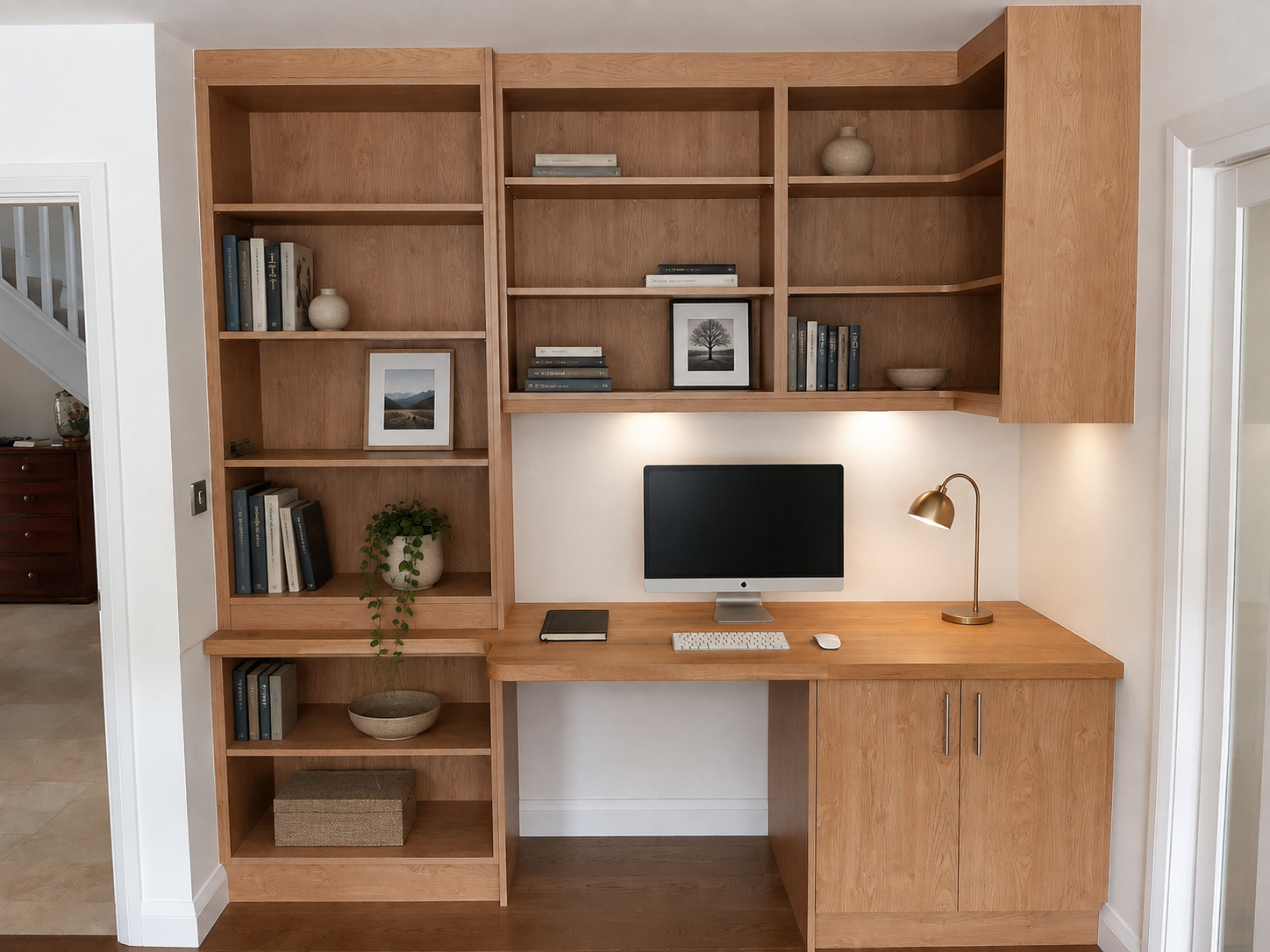 Custom home office cabinetry with fitted desks and storage